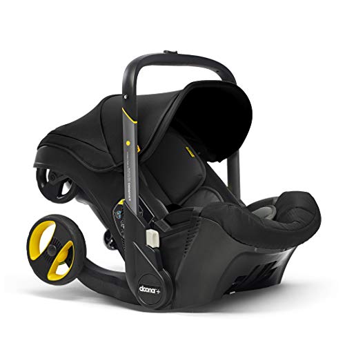 Doona - Carriola Asiento de coche infantil y base con enganche - Asiento de coche a cochecito - Todo en Uno