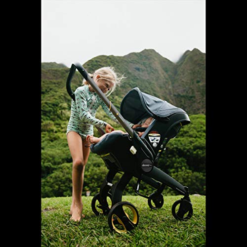 Doona - Carriola Asiento de coche infantil y base con enganche - Asiento de coche a cochecito - Todo en Uno